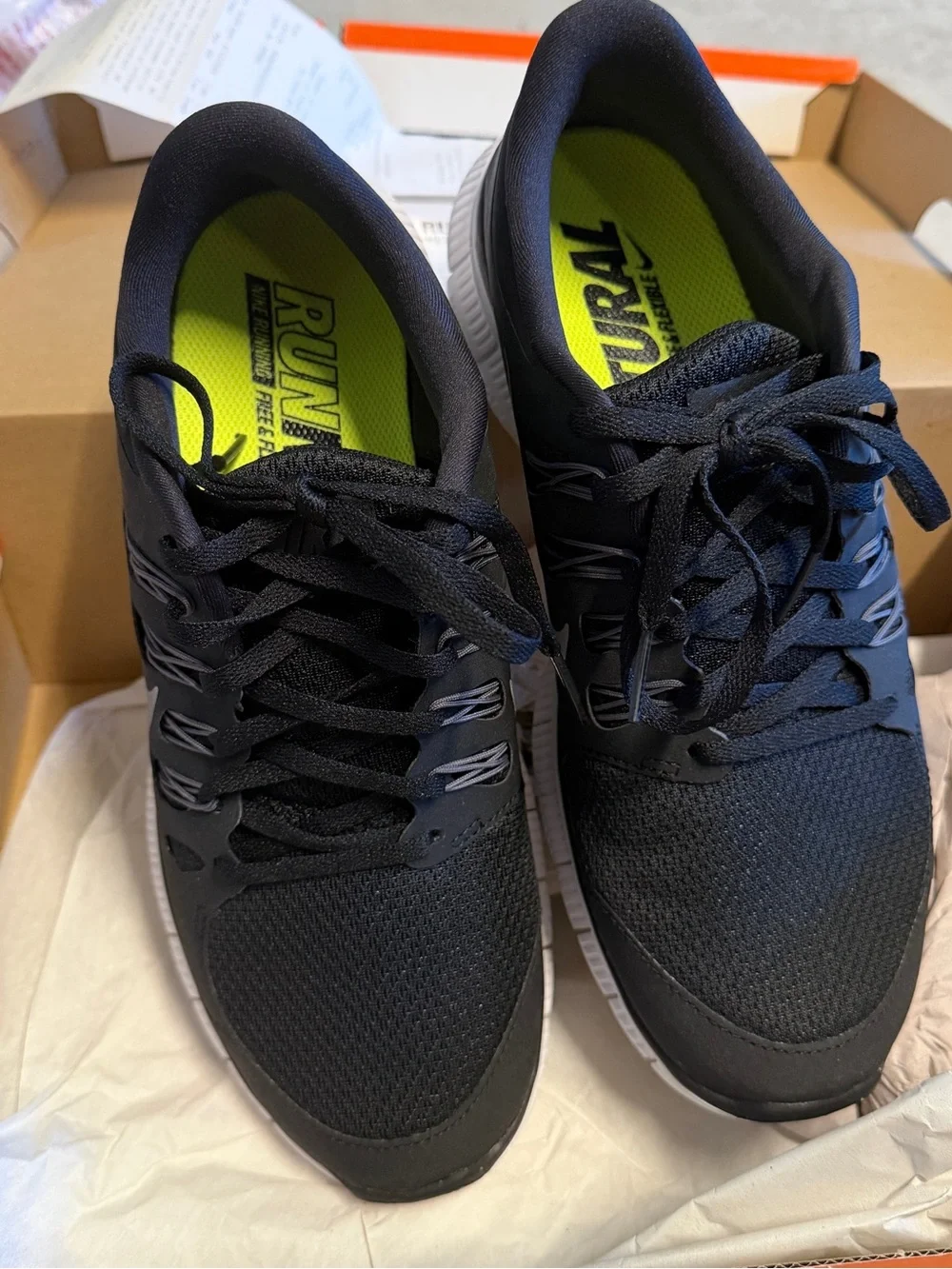 Nike Men’s Black Athletic Sneakers with White Swoosh